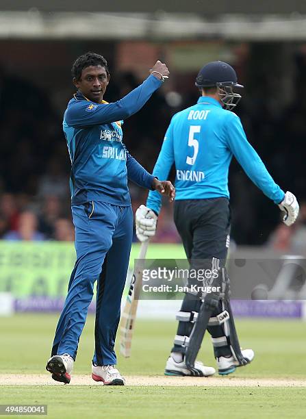 Ajantha Mendis of Sri Lanka celebrates the wicket of Gary Balance of England during the 4th Royal London One Day International match between England...