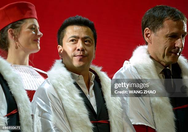 President of the Huayi Brothers Media Group Wang Zhonglei attends the inauguration "Jurade of Saint-Emilion's" first chapter in Beijing on May 31...