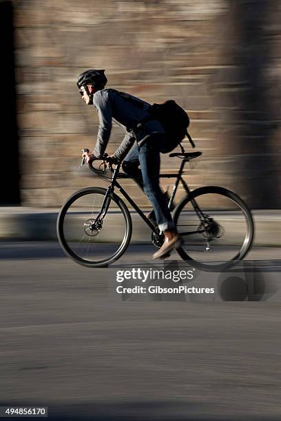 bike messenger - man wearing helmet stock pictures, royalty-free photos & images