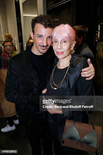 Calligrapher Nicolas Ouchenir and Marie Beltrami attend the Opening of the Collection 'Exemplaire x Nicolas Ouchenir' at Exemplaire Store on October...