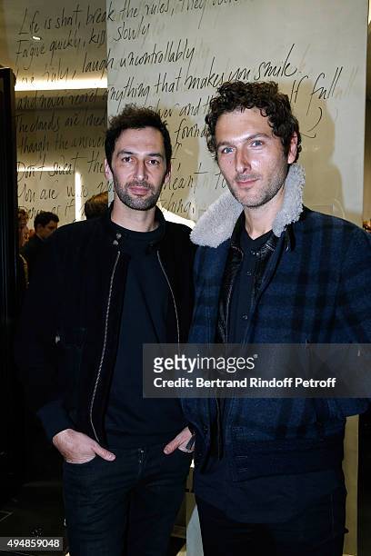 Members of Musical Group Aaron, Olivier Coursier and Simon Buret attend the Opening of the Collection 'Exemplaire x Nicolas Ouchenir' at Exemplaire...