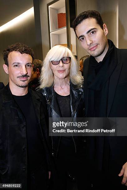 Calligrapher Nicolas Ouchenir, Betty Catroux and Co-Founder of the Store, Jean-Victor Meyers attend the Opening of the Collection 'Exemplaire x...