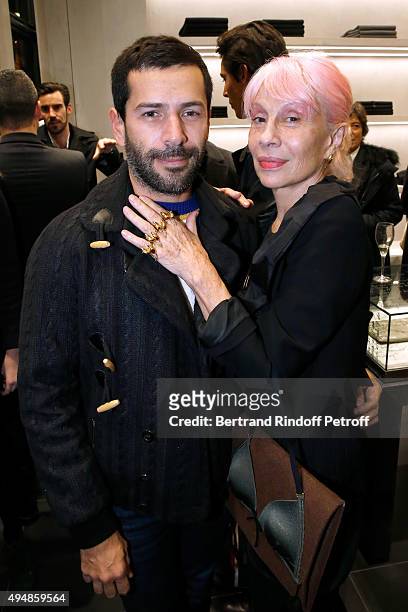 Fashion Designer Alexis Mabille and Marie Beltrami attend the Opening of the Collection 'Exemplaire x Nicolas Ouchenir' at Exemplaire Store on...