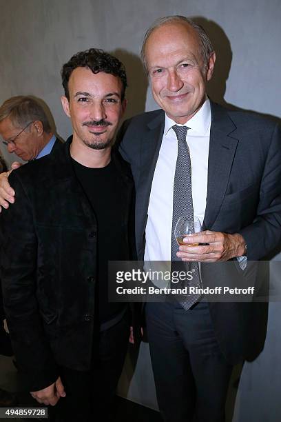 Calligrapher Nicolas Ouchenir and President of l'Oreal Jean-Paul Agon attend the Opening of the Collection 'Exemplaire x Nicolas Ouchenir' at...