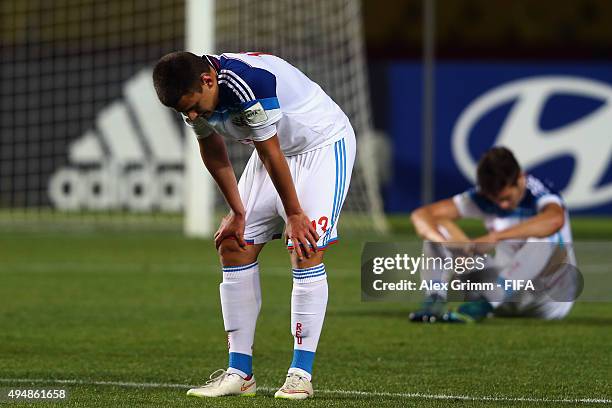 Egor Denisov of Russia reacts after the FIFA U-17 World Cup Chile 2015 Round of 16 match between Russia and Ecuador at Estadio Municipal de...