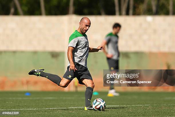 Mark Bresciano of the Socceroos kicks during a FIFA Open Day Australian Socceroos training session at Arena Unimed Sicoob on May 31, 2014 in Vitoria,...
