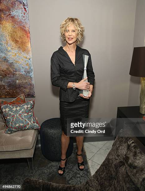Actress, director, honoree Meg Ryan poses with her Lifetime Award prior to "Ithaca" screening during 18th Annual Savannah Film Festival Presented by...