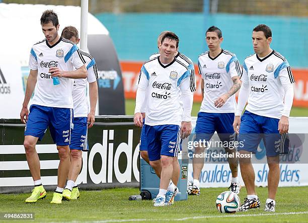 Players of Argentina leave the field after finishing an Argentina training session at Ezeiza Training Camp on May 31, 2014 in Ezeiza, Argentina.