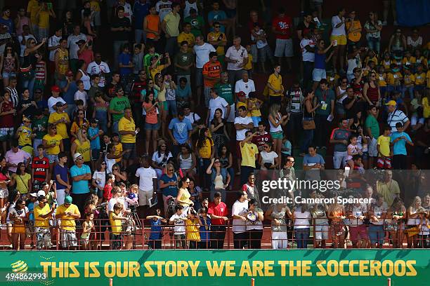 Fans enjoy the atmsophere during the FIFA Open Day Australian Socceroos training session at Arena Unimed Sicoob on May 31, 2014 in Vitoria, Brazil.