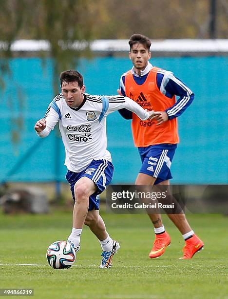 Lionel Messi of Argentina drives the ball during an Argentina training session at Ezeiza Training Camp on May 31, 2014 in Ezeiza, Argentina.