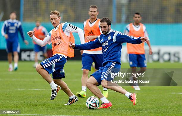 Gonzalo Higuain of Argentina kicks the ball during an Argentina training session at Ezeiza Training Camp on May 31, 2014 in Ezeiza, Argentina.