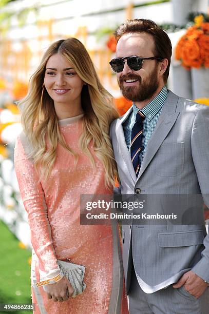 Actors Lauren Parsekian and Aaron Paul attend the seventh annual Veuve Clicquot Polo Classic in Liberty State Park on May 31, 2014 in Jersey City...