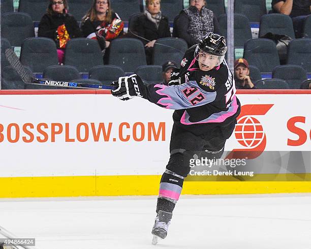 Travis Sanheim of the Calgary Hitmen skates against the Spokane Chiefs during a WHL game at Scotiabank Saddledome on October 29, 2015 in Calgary,...