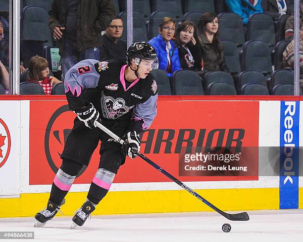 Jake Bean of the Calgary Hitmen skates against the Spokane Chiefs during a WHL game at Scotiabank Saddledome on October 29, 2015 in Calgary, Alberta,...