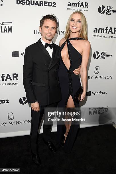 Recording artist Matthew Bellamy of Muse and model Elle Evans attend amfAR's Inspiration Gala Los Angeles at Milk Studios on October 29, 2015 in...