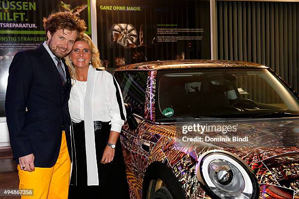 Michael von Hassel and Michaela Portner attend the premiere of the new MINI Clubman on October 29, 2015 in Munich, Germany.