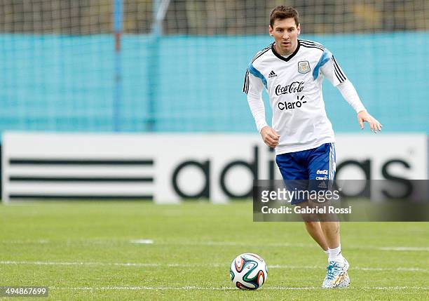 Lionel Messi of Argentina drives the ball during an Argentina training session at Ezeiza Training Camp on May 31, 2014 in Ezeiza, Argentina.
