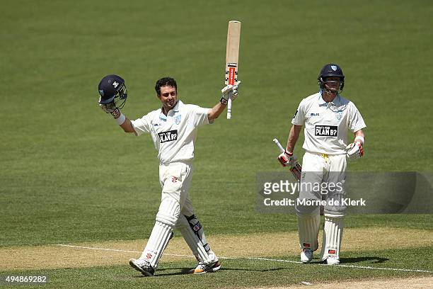 Ed Cowan of the Blues celebrates after reaching 100 runs during day three of the Sheffield Shield match between South Australia and New South Wales...