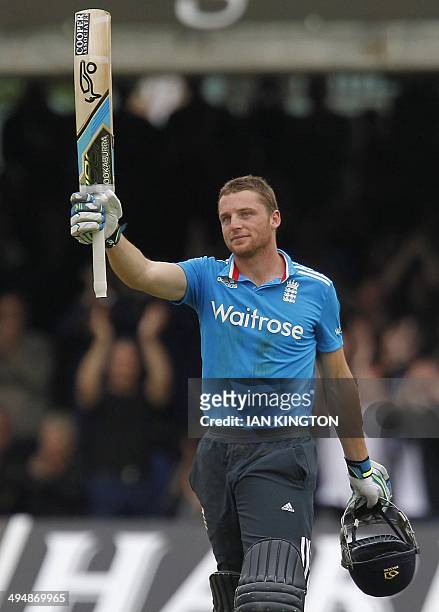 Englands Jos Buttler celebrates after reaching his century not out during play on the fourth ODI cricket match between England and Sri Lanka at...