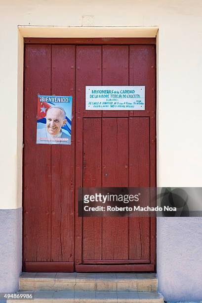 Welcoming the Pope to Cuba: Poster outside the office of Missionaries of Charity of Mother Teresa of Calcutta, in Sancti Spiritus, Cuba. The Pope...