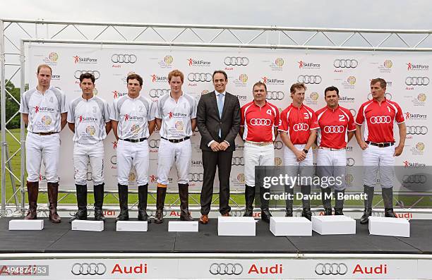 Prince William, Duke of Cambridge, Nic Roldan, Alec White and Prince Harry of Team Quattro, Andre Konsbruck, Director of Audi UK, and Peter Silling,...