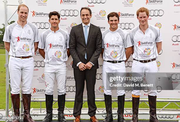 Prince William, Duke of Cambridge, Nic Roldan, Andre Konsbruck, Director of Audi UK, Alec White and Prince Harry attend day one of the Audi Polo...