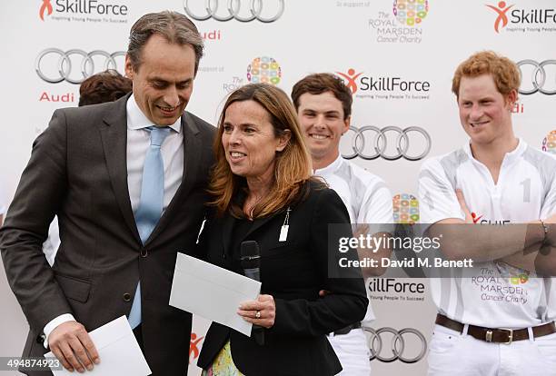 Andre Konsbruck, Director of Audi UK, Cally Palmer, CEO of The Royal Marsden, Alec White and Prince Harry attend day one of the Audi Polo Challenge...