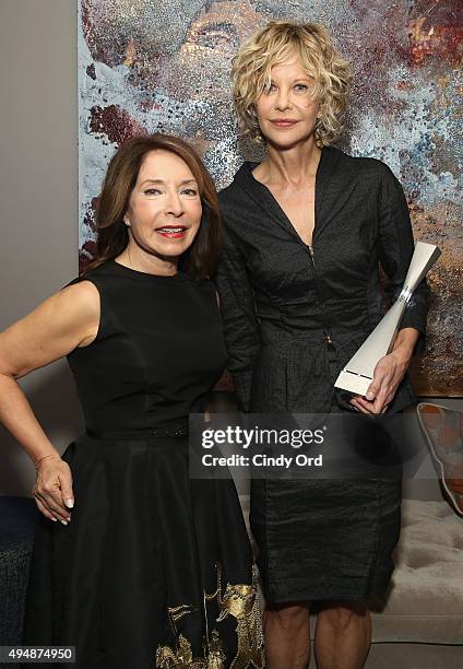 Actress, director, honoree Meg Ryan poses with her Lifetime Award and President and Founder of SCAD Paula Wallace prior to "Ithaca" screening during...