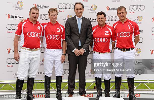 Peter Silling, James Beim, Andre Konsbruck, Director of Audi UK, Nacho Gonzalez and Spencer McCarthy of Team Ultra attend day one of the Audi Polo...