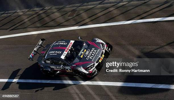 Joey Hand of USA and BMW Team RBM drives during the qualifying for the third round of the DTM 2014 German Touring Car Championship at Hungaroring on...