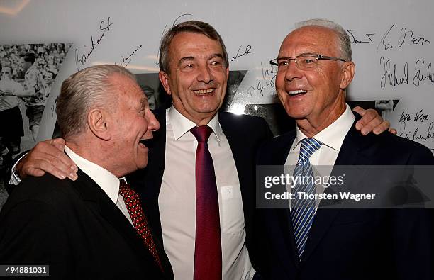 Hanns Schaefer, Wolfgang Niersbach, Frant Beckenbauer smile during the German Football Association wolrd champions party at Intercontinental Hotel on...