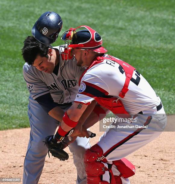 Tyler Flowers of the Chicago White Sox tags out Carlos Quentin of the San Diego Padres during a collison at the plate in the 3rd inning at U.S....