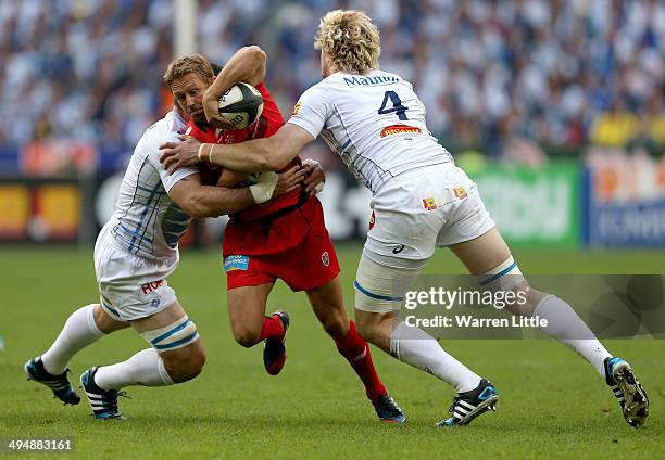 Jonny Wilkinson of Toulon is tackled during the Top 14 Final between Toulon and Castres Olympique at Stade de France on May 31, 2014 in Paris, France.