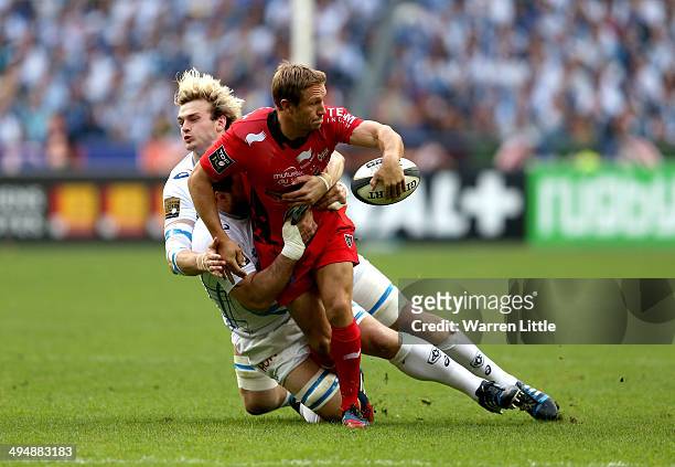 Jonny Wilkinson of Toulon is tackled during the Top 14 Final between Toulon and Castres Olympique at Stade de France on May 31, 2014 in Paris, France.