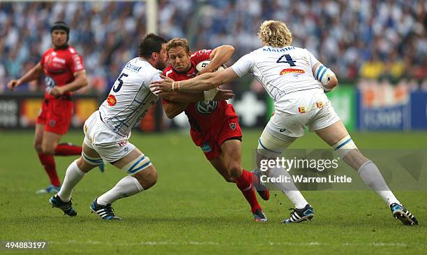 Jonny Wilkinson of Toulon is tackled during the Top 14 Final between Toulon and Castres Olympique at Stade de France on May 31, 2014 in Paris, France.