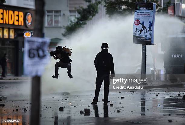 Police in Ankara interfere the group gathering in Kizilay on May 31, 2014 to mark the 1st anniversary of last year's Gezi Park protests which began...