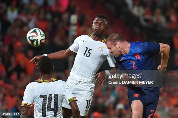 Netherlands' defender Ron Vlaar Ron Vlaar vies with Ghana's defender Rashid Sumaila during the international friendly football match Netherlands...