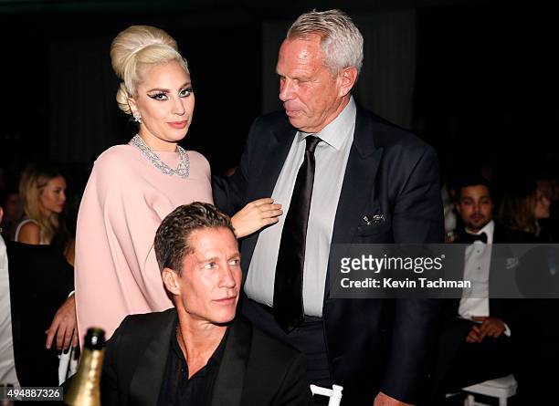 Musician Lady Gaga and chairman and Executive Vice President of the New York Giants Steve Tisch attend the amfAR Inspiration Gala at Milk Studios on...