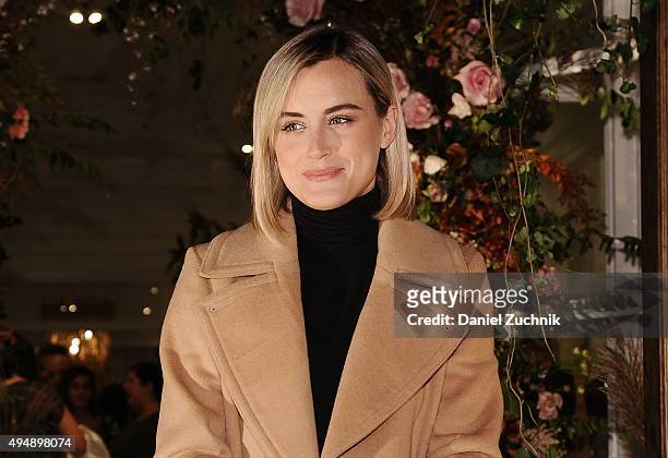 Actress Taylor Schilling attends the Club Monaco Flagship Store Anniversary Event at Club Monaco Fifth Avenue on October 29, 2015 in New York City.