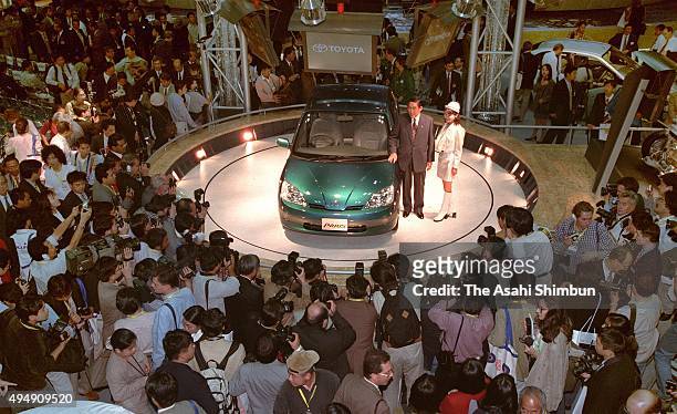 Toyota Motor Co President Hiroshi Okuda introduces 'Prius' during the 32nd Tokyo Motor Show at Makuhari Messe on October 22, 1997 in Chiba, Japan.