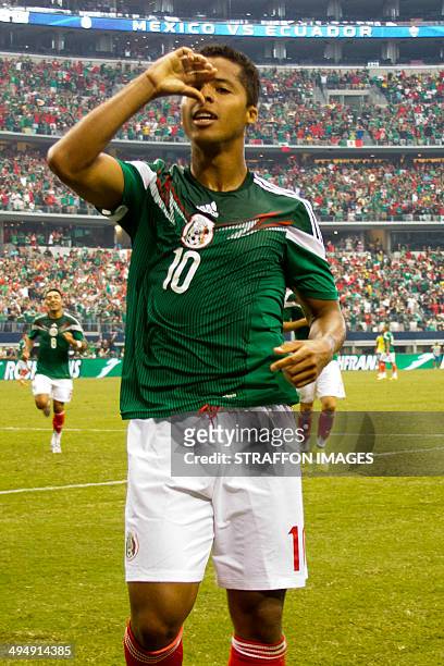 Giovani dos Santos of Mexico celebrates a scored goal, the third of the match, during the International Friendly match between Mexico and Ecuador at...