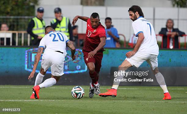 Nani of Portugal battles with Jose Holebas and Giorgos Samaras of Greece during the International Friendly between Portugal and Greece at the...