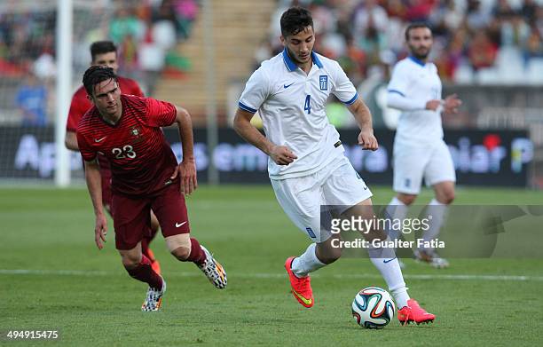 Kostas Manolas of Greece in action during the International Friendly between Portugal and Greece at the National Stadium on May 31, 2014 in Lisbon,...