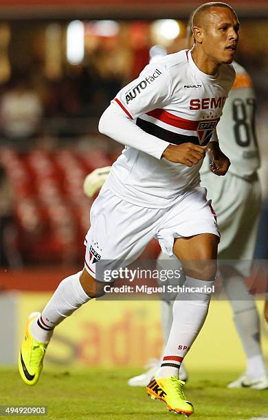 Luis Fabiano of Sao Paulo celebrates scoring the first goal during match between Sao Paulo x Atletico MG of Brasileirao Series A 2014 at Morumbi...