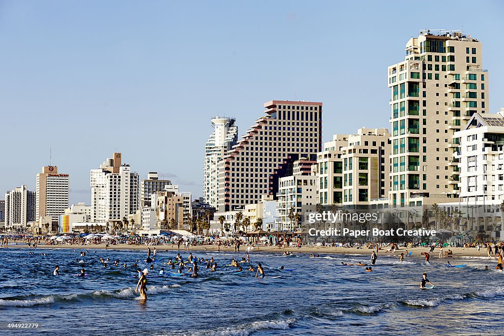Beach and skyscrapers in the back, at Tel Aviv