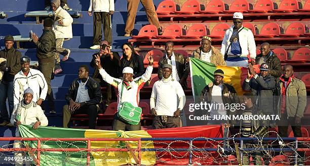 Senegal's supporters cheer for their team before the start of a friendly football match against Colombia at Pedro Bidegain stadium in Buenos Aires,...