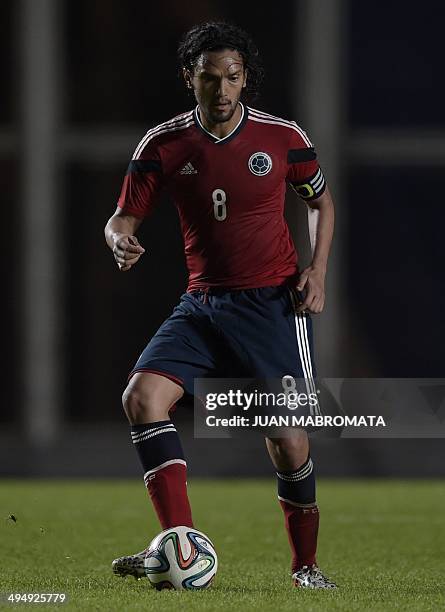Colombia's Abel Aguilar takes the ball during a friendly football match against Senegal, at Pedro Bidegain stadium in Buenos Aires, Argentina on May...