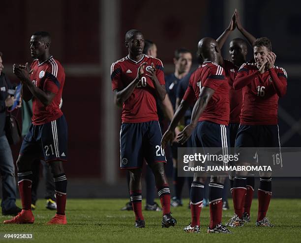 Colombia's footballers applaud at the end of a friendly football match against Senegal, at Pedro Bidegain stadium in Buenos Aires, Argentina on May...