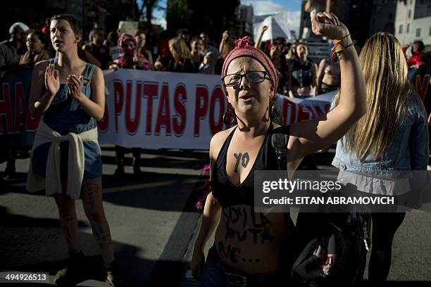 Women shout slogans during the "Marcha de las Putas" , to protest against discrimination and violence against women in Bogota, Colombia, on May 31,...