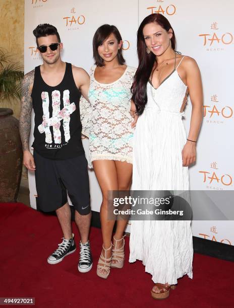 Dancers Mark Ballas, Cheryl Burke and Sharna Burgess arrive at a birthday celebration hosted by Cheryl Burke at the Tao Beach at The Venetian Las...